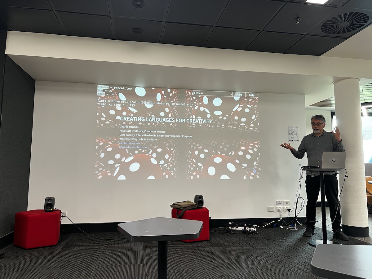 Charlie presenting on creating live coding languages for creativity