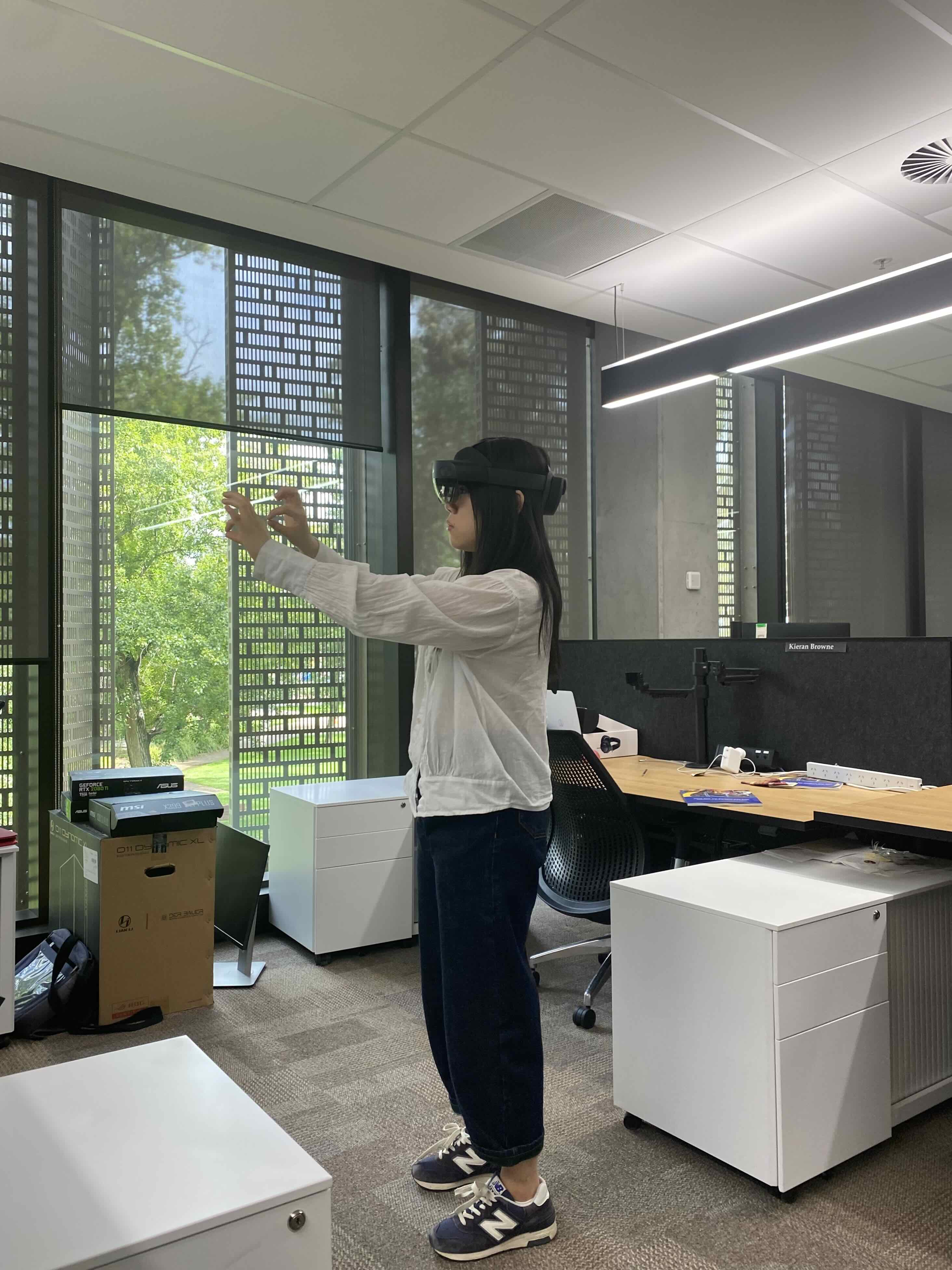 Yichen Wang using a touchless, natural, AR interface, 2021.