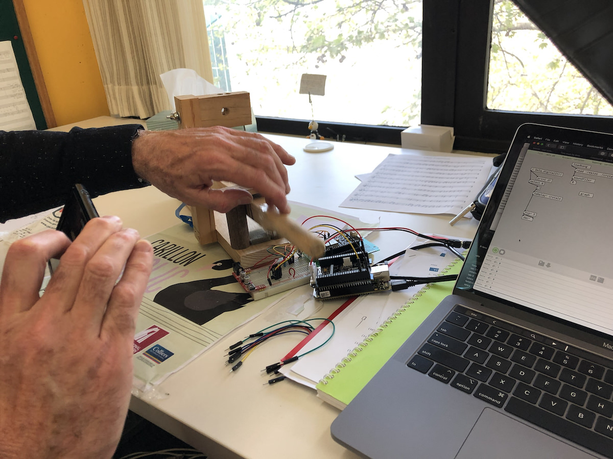 Alistair Riddell testing an electronic carillon key.