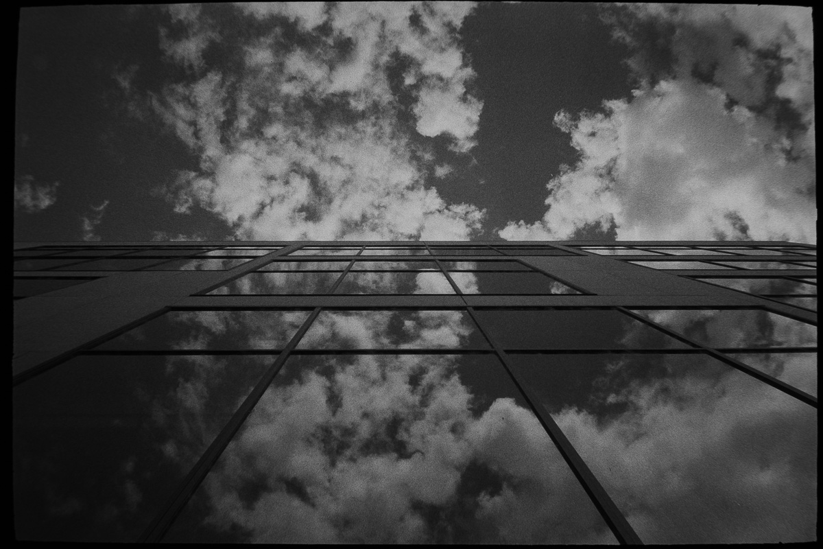 A reflection of the clouds in windows.